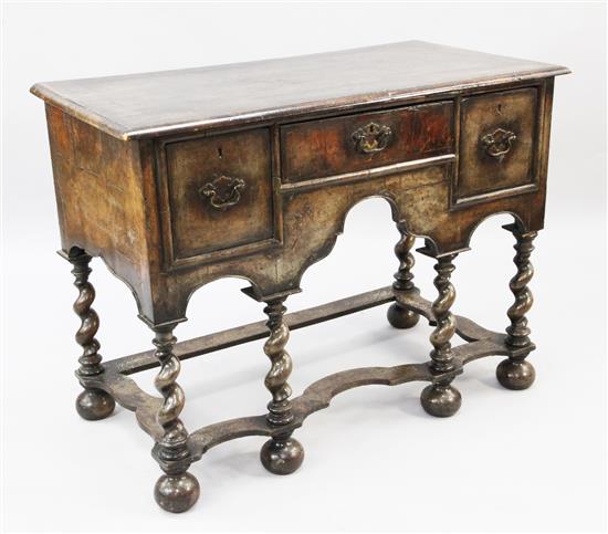 An early 18th century walnut side table, W.3ft 5in. D.1ft 10in. H.2ft 7in.